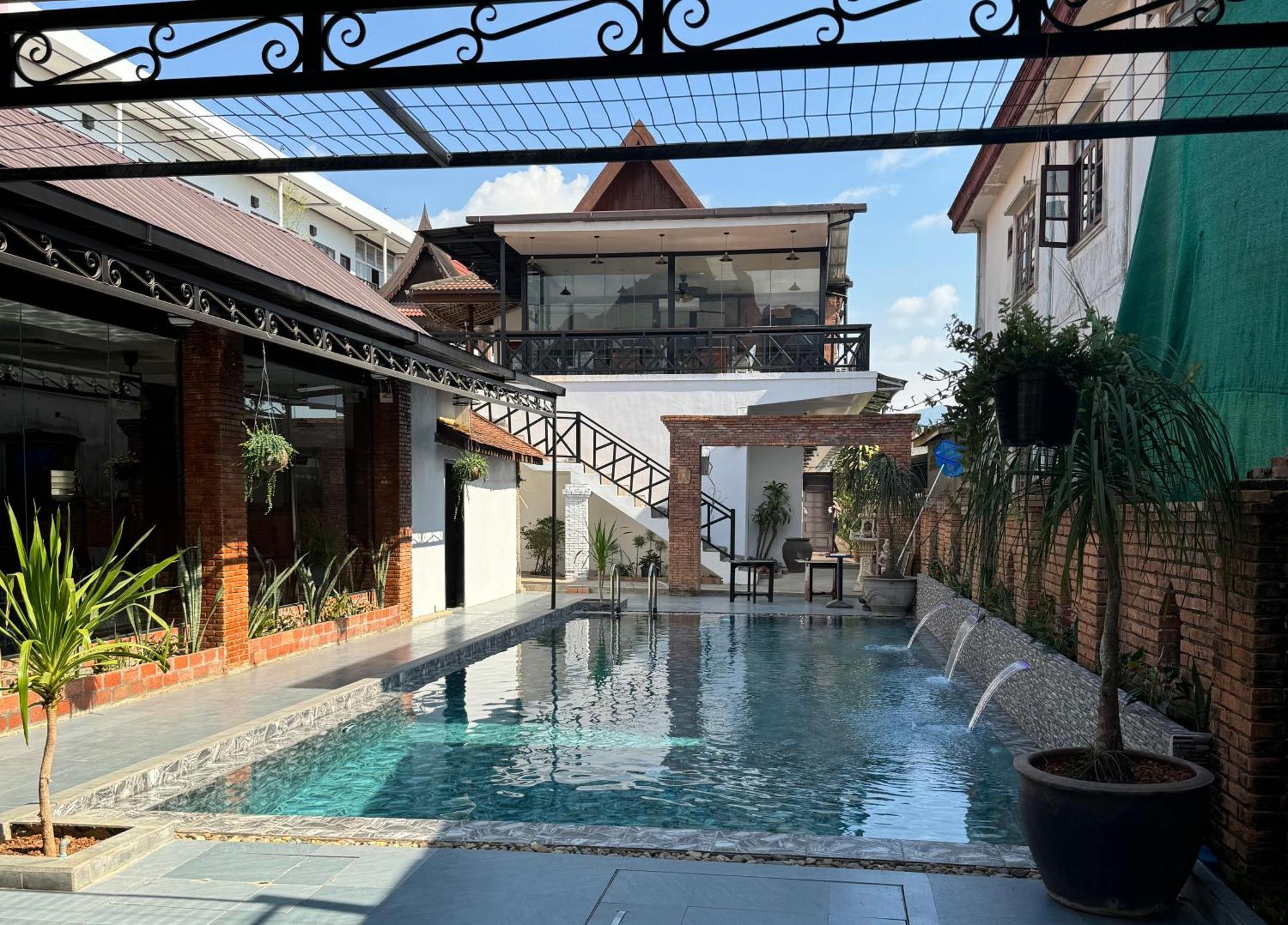 Win Hotel Vang Vieng Exterior foto