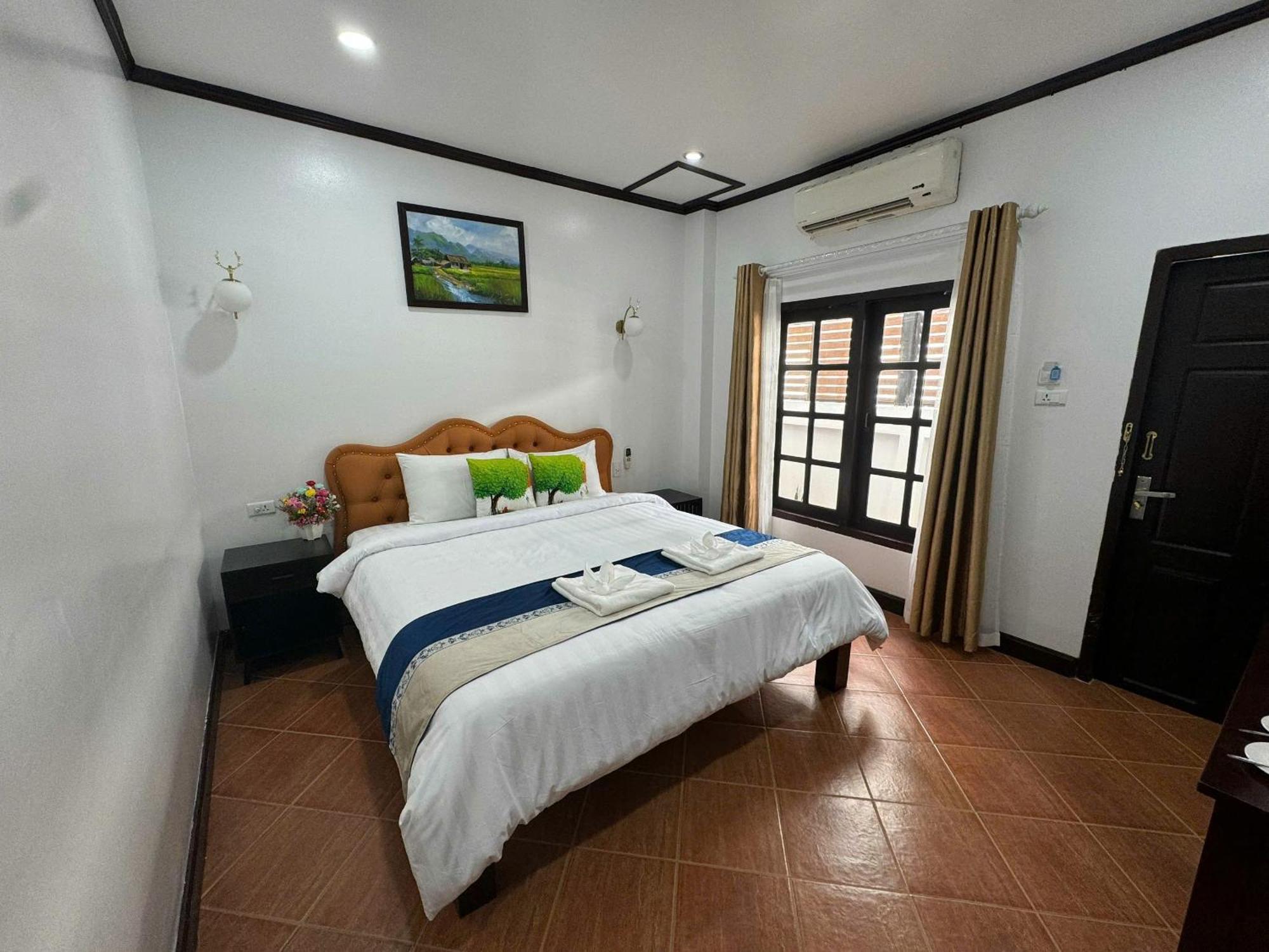 Win Hotel Vang Vieng Exterior foto